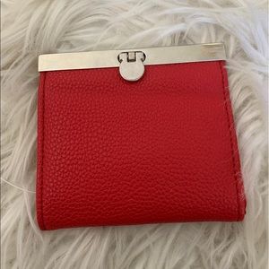 red coin and card purse